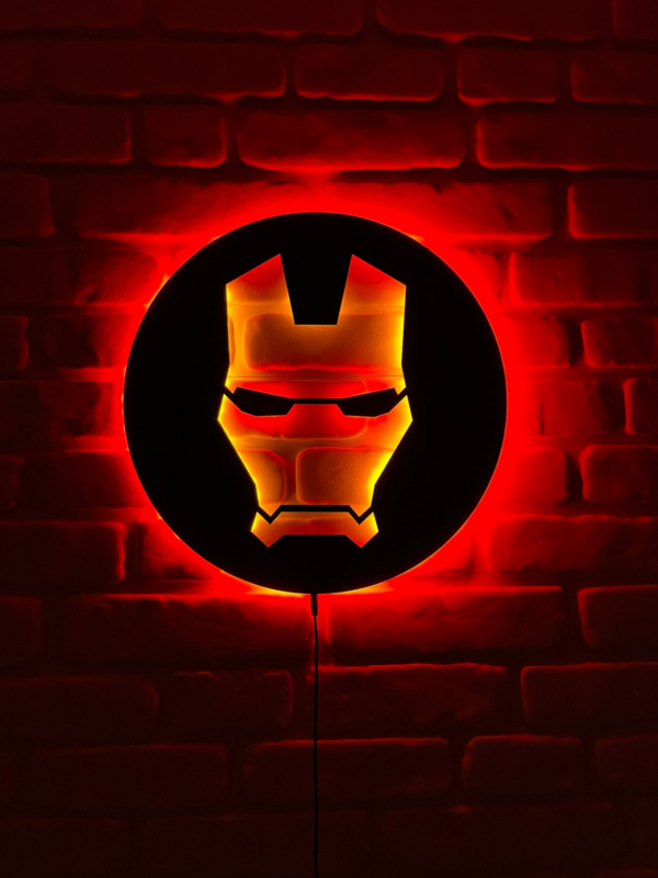 Product Title: "Iron Man LED Wall Light - Superhero Red Glow Mask Decor" Short Description: "Elevate your space with our Iron Man LED Wall Light! Inspired by the iconic superhero, this red glow mask decor is a must-have for fans. Add a touch of heroism to any room with this eye-catching piece." Bullet Points with Emojis: - 💡 Illuminate your room with the power of Iron Man's mask. - 🦸‍♂️ Perfect for superhero enthusiasts and collectors. - 🎨 Adds a bold and dynamic accent to your wall decor. - 🎁 Makes a fantastic gift for fans of the Marvel universe. - 💪 Easy to install and operate, bringing superhero vibes instantly. Details: This LED wall light features Iron Man's iconic mask design, emitting a vibrant red glow that adds a heroic ambiance to your space. It's crafted with high-quality materials for durability and longevity. Whether you're a die-hard Marvel fan or simply love unique decor, this Iron Man LED wall light is sure to impress with its attention to detail and superhero-inspired charm.